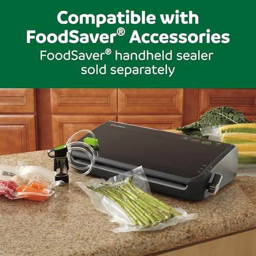 FoodSaver FM2100 Vacuum Sealer Machine, One-Touch Sealing, Roll Storage & Cutter, Dry & Moist Food, For Sous Vide Cooking, Accessory Port & Hose, Starter Bags & Roll Included