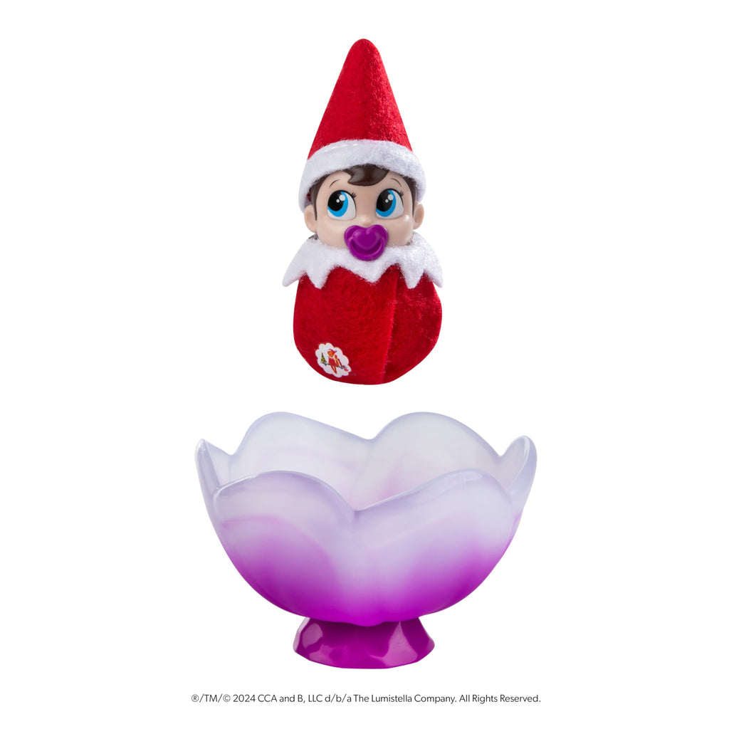 The Elf on the Shelf Frost Pips Mini Blooms Elf Baby Girl with Blue Eyes | Includes a Frost Pips Elf Baby Girl with blue eyes and Frost Flower Cradle.