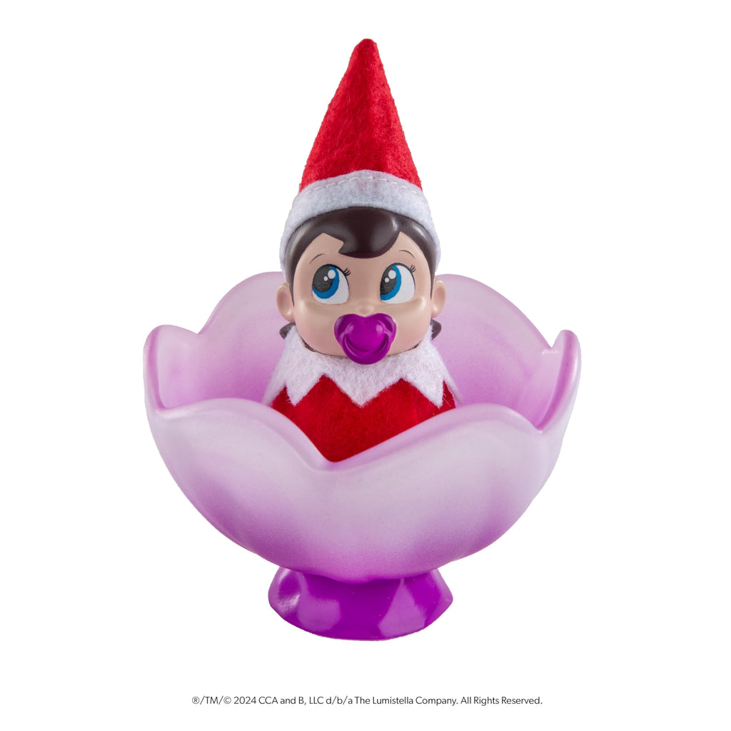 The Elf on the Shelf Frost Pips Mini Blooms Elf Baby Girl with Blue Eyes | Includes a Frost Pips Elf Baby Girl with blue eyes and Frost Flower Cradle.